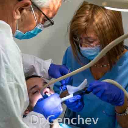 Dr Genchev fixes a basal dental implant with his wife 