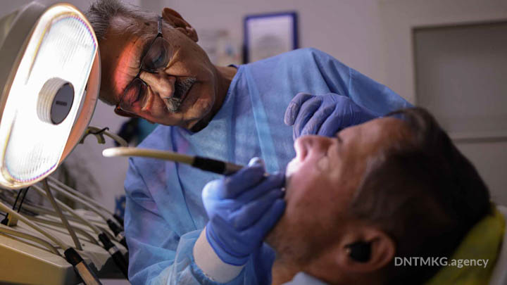 Dr Genchev fixing a basal dental implant for bruxism